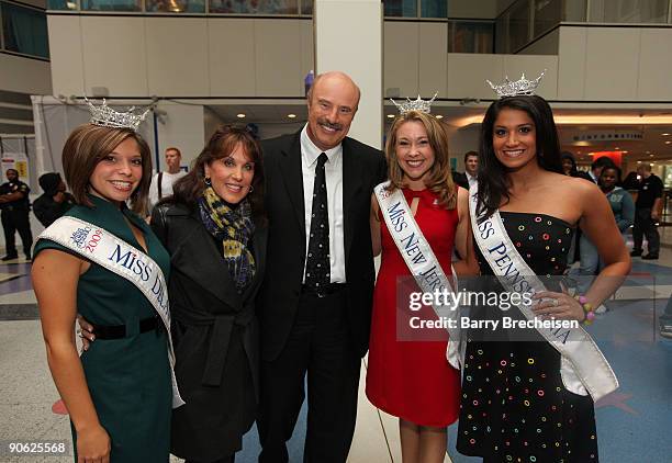 Dr. Phil McGraw and wife Robin McGraw appear at the Children's Hospital of Philadelphia for the Dr. Phil Hits The Streets to Launch 8th Season of Dr...