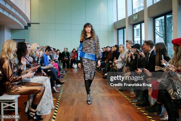 Model walks the runway during the Rebekka Ruetz Fashion Show at Embassy of Austria on January 16, 2018 in Berlin, Germany.