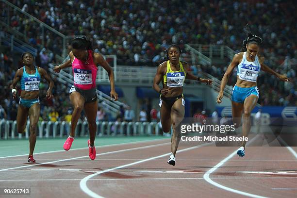 Allyson Felix of USA wins the women's 200m from Sanya Richards of USA and Debbie Ferguson-McKenzie of Bahamas during day one of the IAAF World...