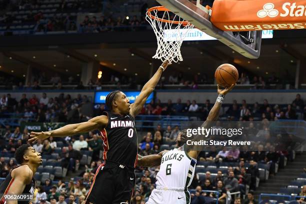 Eric Bledsoe of the Milwaukee Bucks is defended by Josh Richardson of the Miami Heat during the first half of a game at the Bradley Center on January...