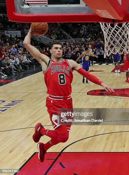 Zach LaVine of the Chicago Bulls goes up for a dunk against the Golden State Warriors at the United Center on January 17, 2018 in Chicago, Illinois....