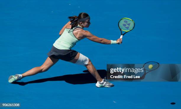 Anastasija Sevastova of Latvia plays a backhand in her second round match against Maria Sharapova of Russia on day four of the 2018 Australian Open...