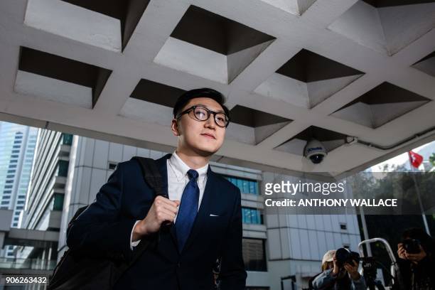Pro-independence protestor Edward Leung arrives at the High Court before facing rioting charges in Hong Kong on January 18 for his part in the...