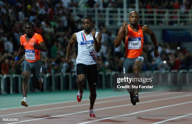 Tyson Gay of USA beats Asafa Powell of Jamiaca to win the Mens 100 metres during day one of the IAAF World Athletics Final at the Kaftanzoglio...