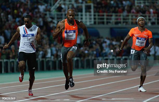 Tyson Gay of USA beats Asafa Powell of Jamiaca to win the Mens 100 metres during day one of the IAAF World Athletics Final at the Kaftanzoglio...