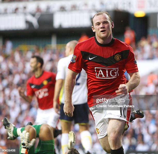 Wayne Rooney of Manchester United celebrates scoring their third goal during the FA Barclays Premier League match between Tottenham Hotspur and...