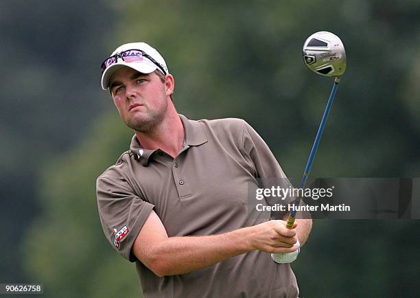 Marc Leishman of Australia watches his tee shot on the fifth hole during the third round of the BMW Championship at Cog Hill Golf & Country Club on...