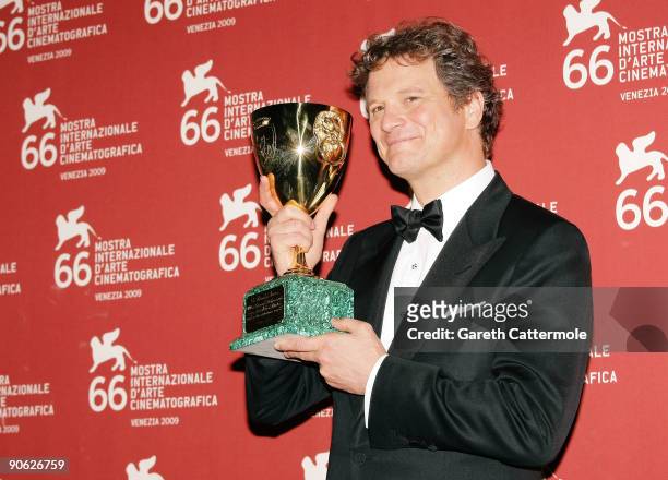 Actor Colin Firth holds his Best Actor award while attending the Closing Ceremony photocall at the Palazzo del Casino during the 66th Venice Film...