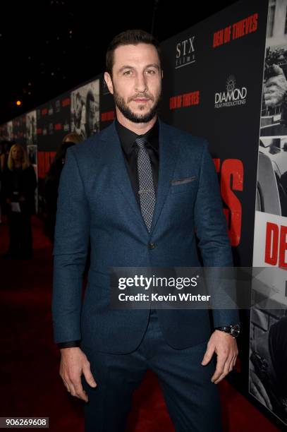 Pablo Schreiber attends the premiere of STX Films' "Den of Thieves" at Regal LA Live Stadium 14 on January 17, 2018 in Los Angeles, California.