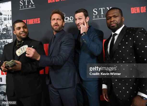 Shea Jackson Jr., Gerard Butler, Pablo Schreiber and 50 Cent attend the premiere of STX Films' "Den of Thieves" at Regal LA Live Stadium 14 on...