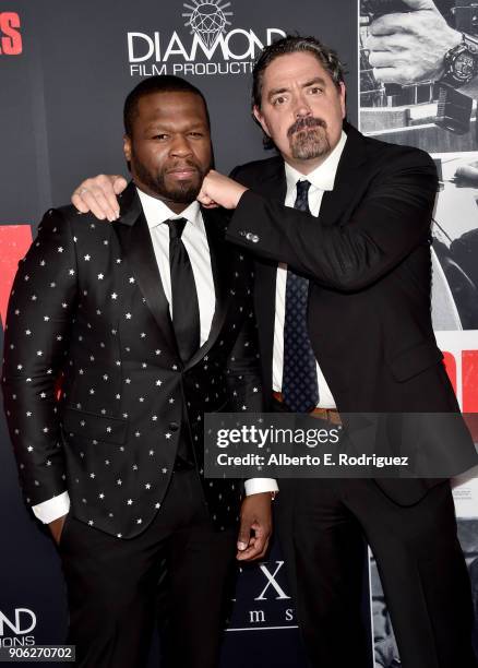 Cent and Christian Gudegast attend the premiere of STX Films' "Den of Thieves" at Regal LA Live Stadium 14 on January 17, 2018 in Los Angeles,...