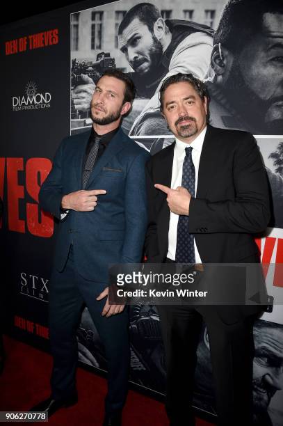 Pablo Schreiber and Christian Gudegast attend the premiere of STX Films' "Den of Thieves" at Regal LA Live Stadium 14 on January 17, 2018 in Los...