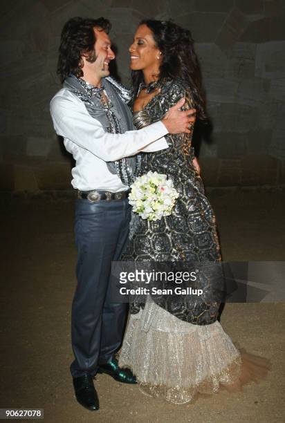 Barbara Becker and Arne Quinze arrive for their wedding party at Belvedere Palace on September 12, 2009 in Potsdam, Germany.