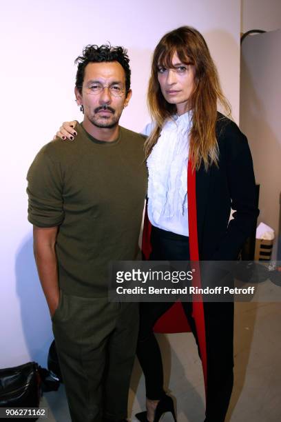 Stylist Haider Ackermann and Caroline de Maigret pose after the Haider Ackermann Menswear Fall/Winter 2018-2019 show as part of Paris Fashion Week on...