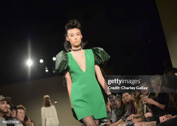 Model walks the runway during the Wolk Morais Collection 6 Fashion Show at The Hollywood Roosevelt Hotel on January 17, 2018 in Los Angeles,...