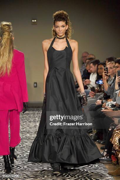 Model walks runway during the Wolk Morais Collection 6 Fashion Show at The Hollywood Roosevelt Hotel on January 17, 2018 in Los Angeles, California.
