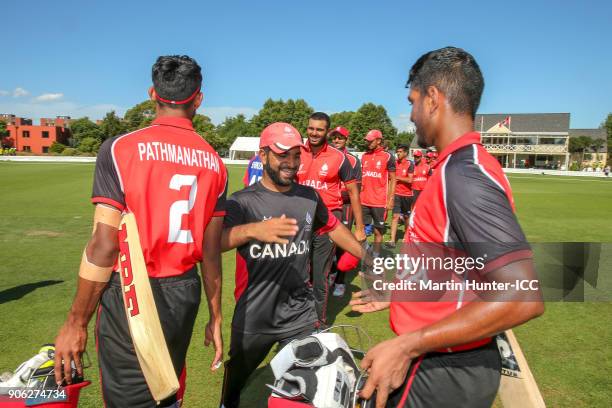 Canada team mates celebrate after the ICC U19 Cricket World Cup match between Namibia and Canada at Bert Sutcliffe Oval on January 18, 2018 in...