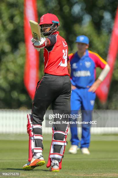 Akash Gill of Canada celebrates after reaching his half century during the ICC U19 Cricket World Cup match between Namibia and Canada at Bert...