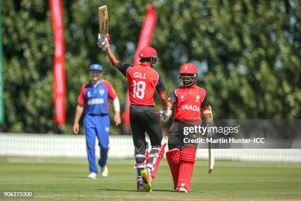 Akash Gill of Canada celebrates after reaching his half century during the ICC U19 Cricket World Cup match between Namibia and Canada at Bert...