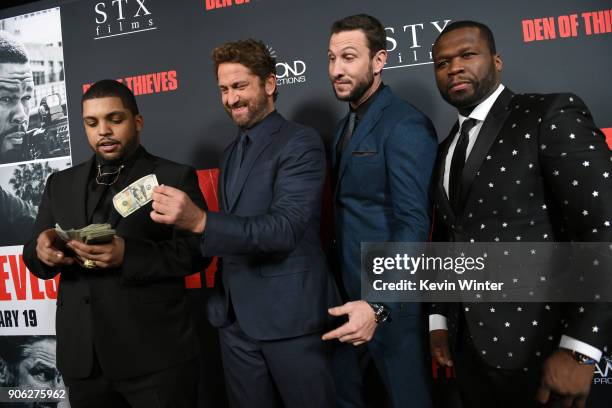 Shea Jackson Jr., Gerard Butler, Pablo Schreiber and 50 Cent attend the premiere of STX Films' "Den of Thieves" at Regal LA Live Stadium 14 on...