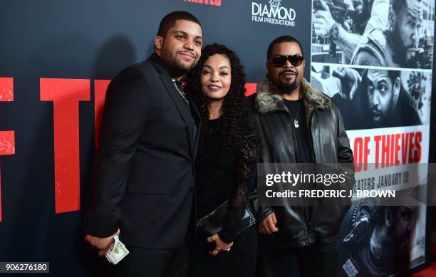 Actor O'Shea Jackson Jr. With parents Kimberly Woodruff and O'Shea "Ice Cube" Jackson arrive for the premiere of the film "Den of Thieves" in Los...