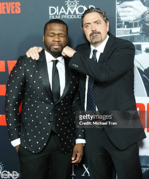 Curtis "50 Cent" Jackson and Christian Gudegast arrive to Los Angeles premiere of STX Films' "Den Of Thieves" held at Regal LA Live Stadium 14 on...