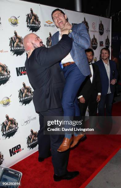 Strongman Brian Shaw and actor Alain Moussi attend the premiere of Well Go USA Entertainment's "Kickboxer: Retaliation" at ArcLight Cinemas on...