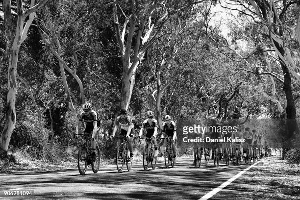 Riders compete through Willunga during stage three of the 2018 Tour Down Under on January 18, 2018 in Adelaide, Australia.