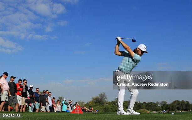 Tommy Fleetwood of England plays his shot from the 18th tee during round one of the Abu Dhabi HSBC Golf Championship at Abu Dhabi Golf Club on...