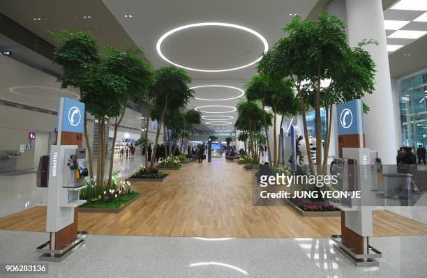 General view shows the arrival lobby at Terminal 2 of Incheon International Airport, west of Seoul, on January 18, 2018. - Incheon airport, South...