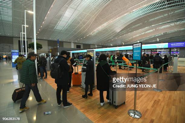 General view shows the departure lobby at Terminal 2 of Incheon International Airport, west of Seoul, on January 18, 2018. Incheon airport, South...