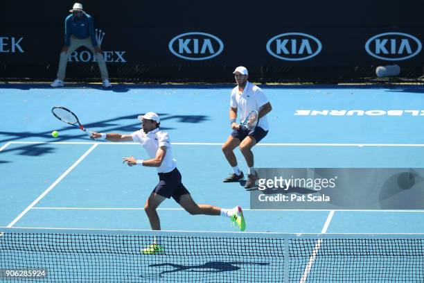 Jeremy Chardy of France and Fabrice Martin of France compete in their first round men's doubles match against Pablo Cuevas of Uruguay and Horacio...