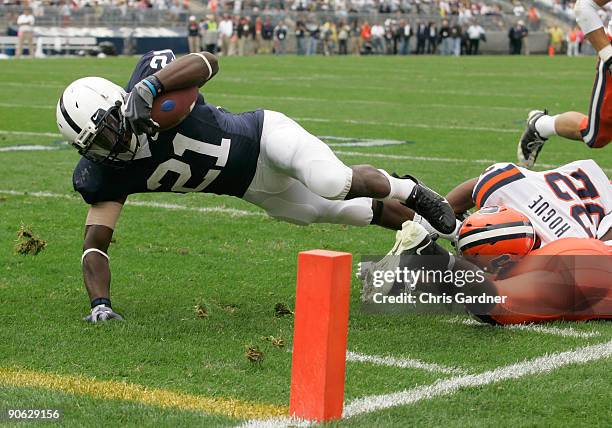 Tailback Stefon Green of the Penn State Nittany Lions is tackled short of the goal line by linebacker Doug Hogue of the Syracuse Orangemen during the...