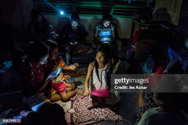 Residents displaced by the eruption of Mayon volcano settle inside a public school on January 17, 2018 in Legazpi, Albay, Philippines. Thousands...