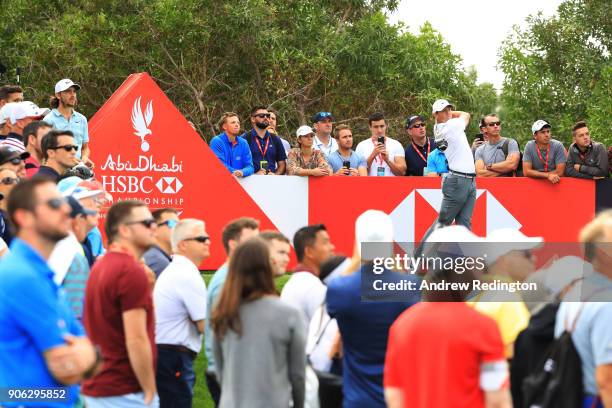 Rory McIlroy of Northern Ireland plays his shot from the eighth tee during round one of the Abu Dhabi HSBC Golf Championship at Abu Dhabi Golf Club...