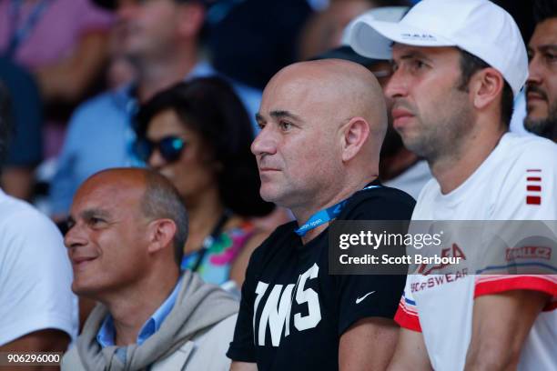 Andre Agassi watches the second round match between Novak Djokovic of Serbia and Gael Monfils of France on day four of the 2018 Australian Open at...