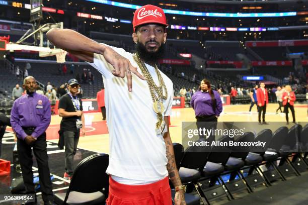Rapper Nipsey Hussle attends a basketball game between the Los Angeles Clippers and the Denver Nuggets at Staples Center on January 17, 2018 in Los...