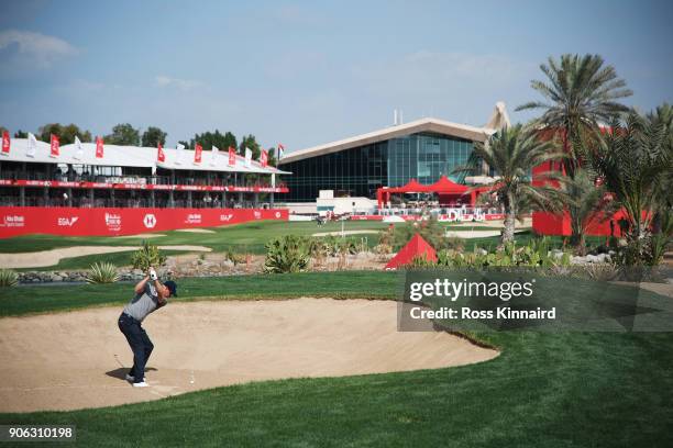 Mikko Ilonen of Finland plays his second shot from a bunker on the 18th hole during round one of the Abu Dhabi HSBC Golf Championship at Abu Dhabi...