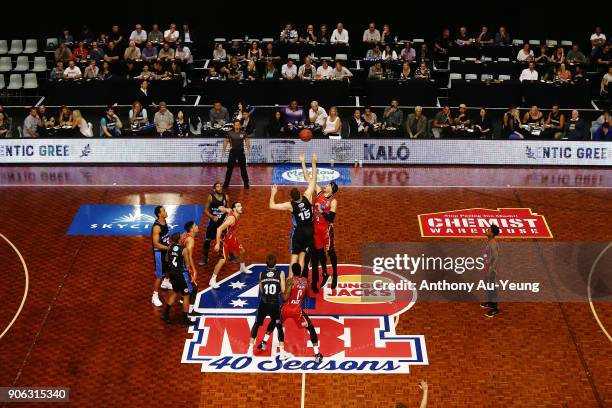 Rob Loe of the Breakers tips off against Josh Boone of United during the round 16 NBL match between the New Zealand Breakers and Melbourne United at...