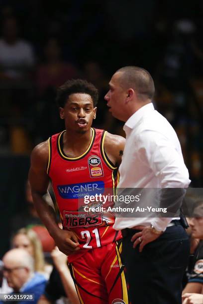 Casper Ware of United celebrates his three pointer as Head Coach Paul Henare of the Breakers looks on during the round 16 NBL match between the New...