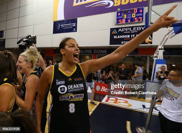 Elizabeth Cambage of the Melbourne Boomers celebrates after the Boomers defeayed the Fire during game two of the WNBL Grand Final series between the...
