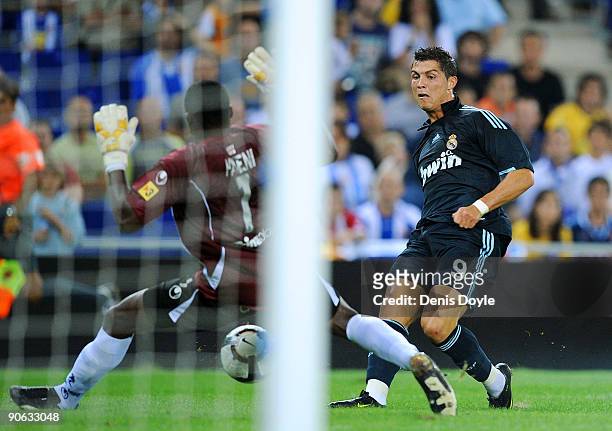 Cristiano Ronaldo of Real Madrid scores a goal past Carlos Kameni of Espanyol during the La Liga match between Espanyol and Real Madrid at the Nuevo...