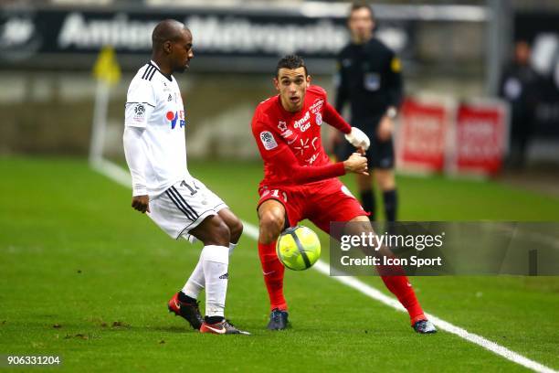 Ellyes of Montpellier and KAKUTA Gael of Amiens during the Ligue 1 match between Amiens SC and Montpellier Herault SC at Stade de la Licorne on...