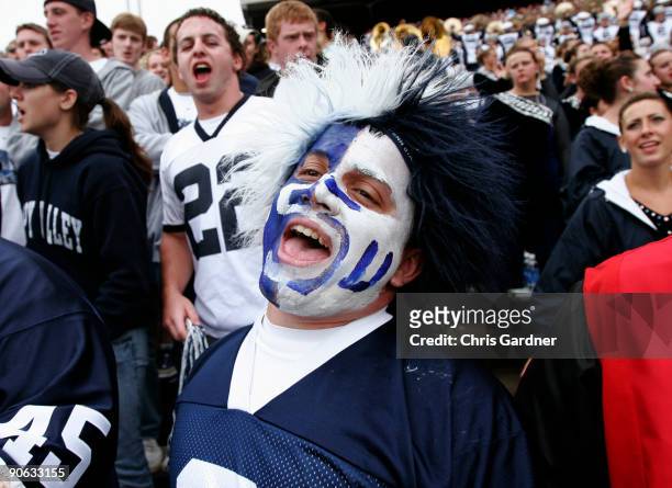 Member of the student's section sings a song during the second half of their game against the Syracuse Orangemen at Beaver Stadium September 12, 2009...