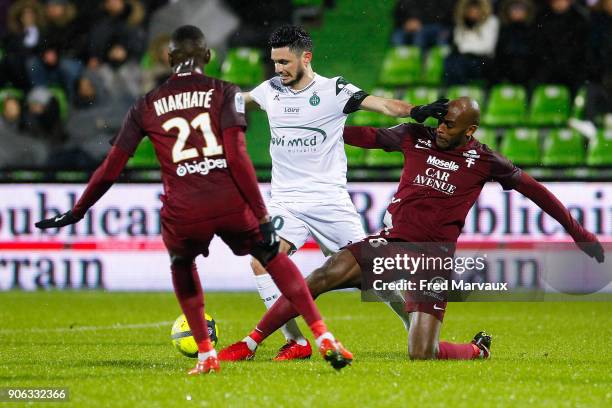 Remy Cabella of Saint Etienne and Jonathan Rivierez of Metz during the Ligue 1 match between Metz and AS Saint-Etienne at on January 17, 2018 in...