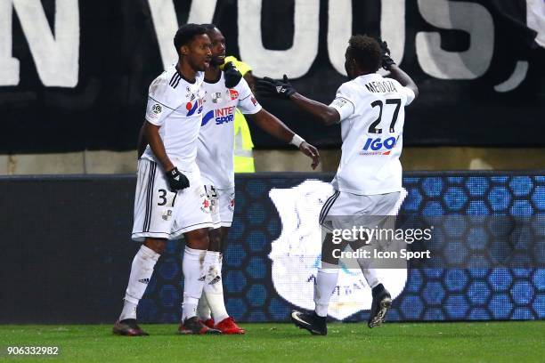 Moussa of Amiens and GAKPE Serge of Amiens celebrate his goal during the Ligue 1 match between Amiens SC and Montpellier Herault SC at Stade de la...