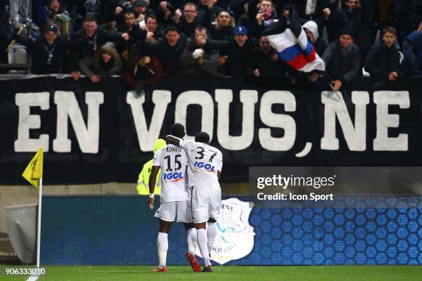 Moussa of Amiens and GAKPE Serge of Amiens celebrate his goal during the Ligue 1 match between Amiens SC and Montpellier Herault SC at Stade de la...