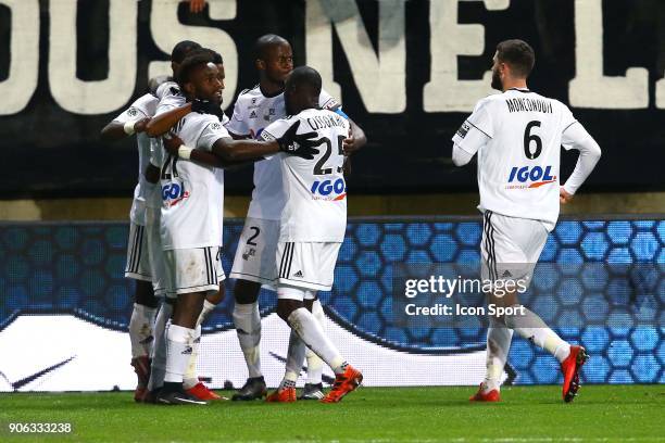 Moussa of Amiens and GAKPE Serge of Amiens and MONCONDUIT Thomas of Amiens celebrate his goal during the Ligue 1 match between Amiens SC and...