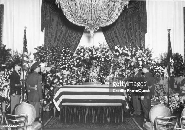 View of an honor guard standing watch over President Franklin D Roosevelt's casket in the White House's East Room, Washington DC, April 14, 1945.