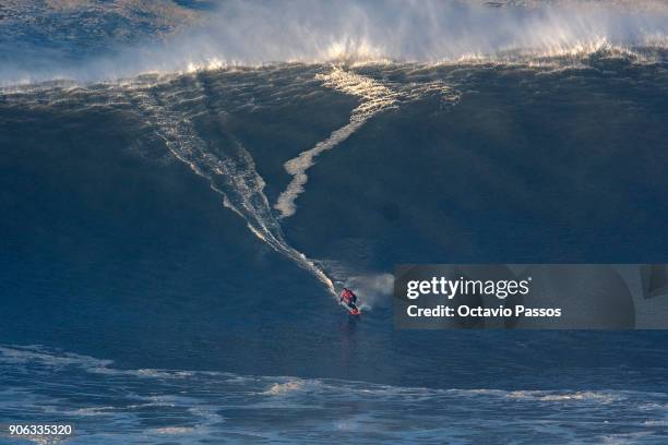 Australian big wave surfer Ross Clarke-Jones, drops a wave during a surf session at Praia do Norte on January 18, 2018 in Nazare, Portugal.